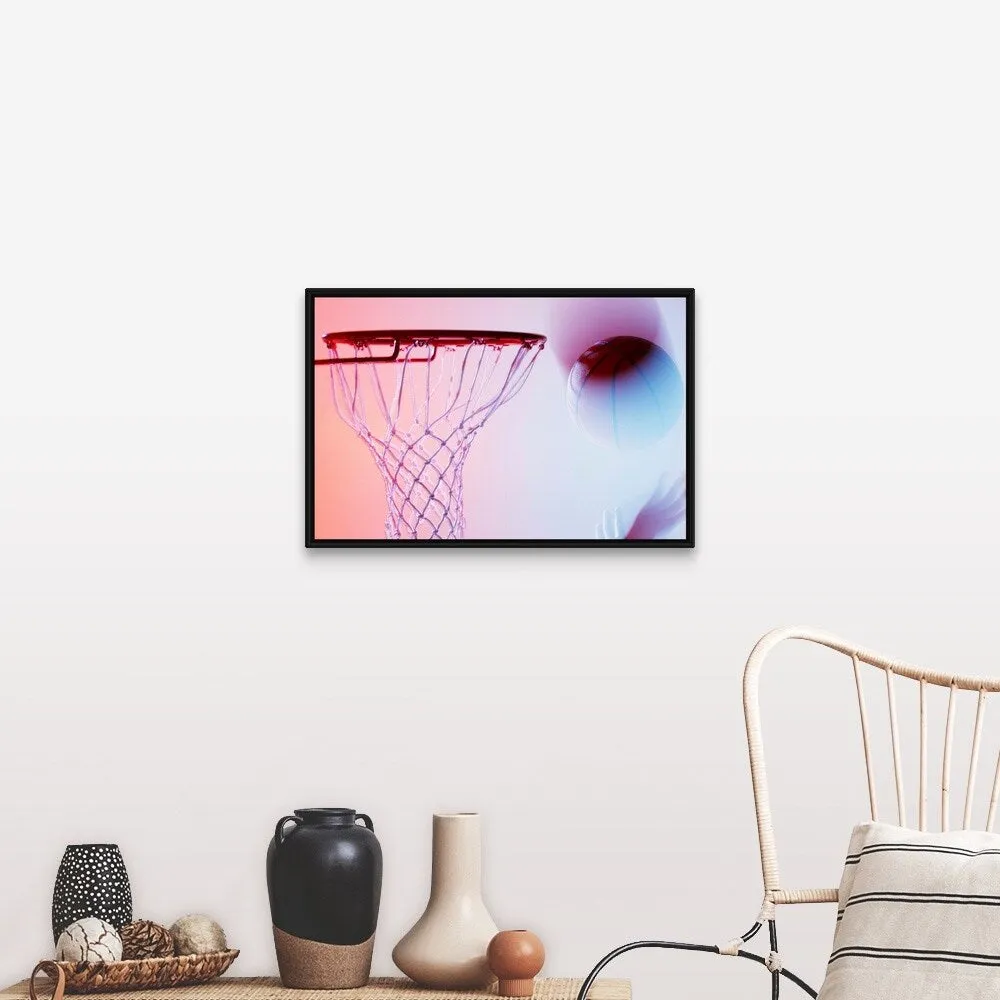 "Blurred view of basketball going into hoop" Black Float Frame Canvas Art
