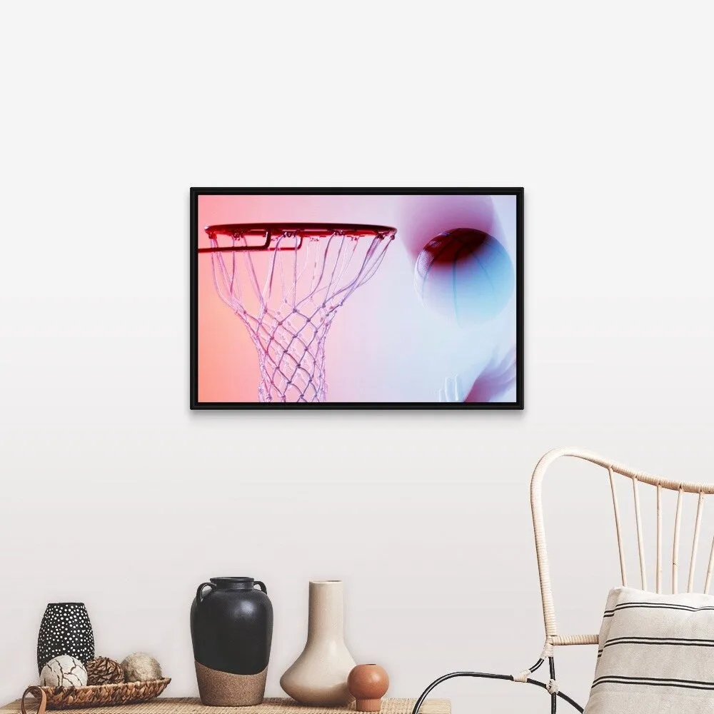 "Blurred view of basketball going into hoop" Black Float Frame Canvas Art