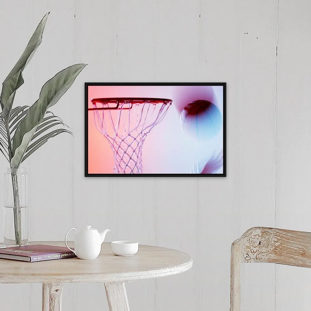 "Blurred view of basketball going into hoop" Black Float Frame Canvas Art